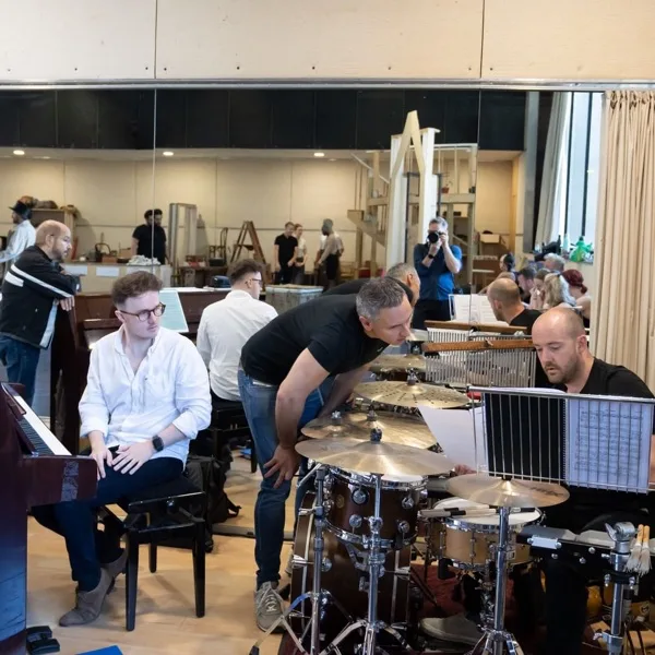 Luke Holman at the piano in rehearsals for Crazy For You in Chichester